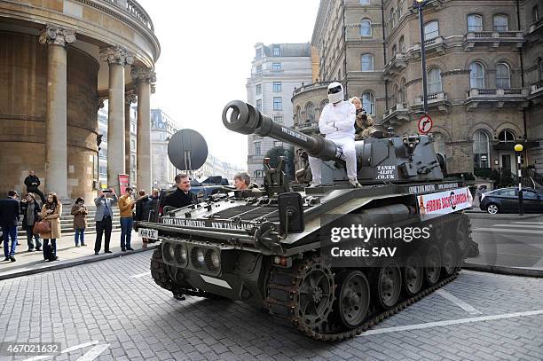 The Stig sighting at The BBC on March 20, 2015 in London, England. The Stig arrived in a tank to deliver a petition, Change.orgs fastest ever growing...