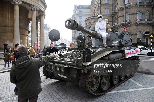 The Stig sighting at The BBC on March 20, 2015 in London, England. The Stig arrived in a tank to deliver a petition, Change.orgs fastest ever growing...