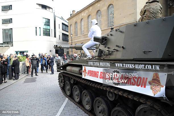 The Stig sighting at The BBC on March 20, 2015 in London, England. The Stig arrived in a tank to deliver a petition, Change.orgs fastest ever growing...