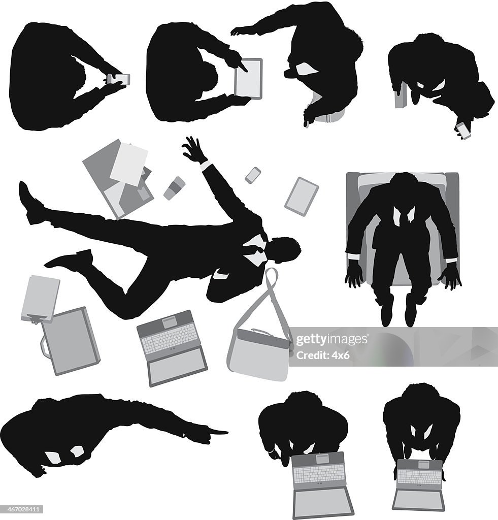 Silhouette of a businessman with office accessories