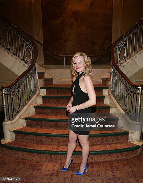 Actress Elisabeth Moss poses for a photo at "The Heidi Chronicles" Broadway Opening Night at The Music Box Theatre on March 19, 2015 in New York City.