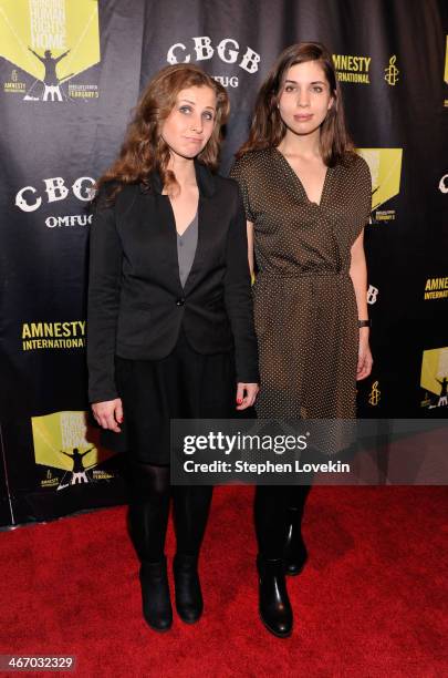 Maria Alyokhina and Nadezhda Tolokonnikova of Pussy Riot attend the Amnesty International Concert presented by the CBGB Festival at Barclays Center...