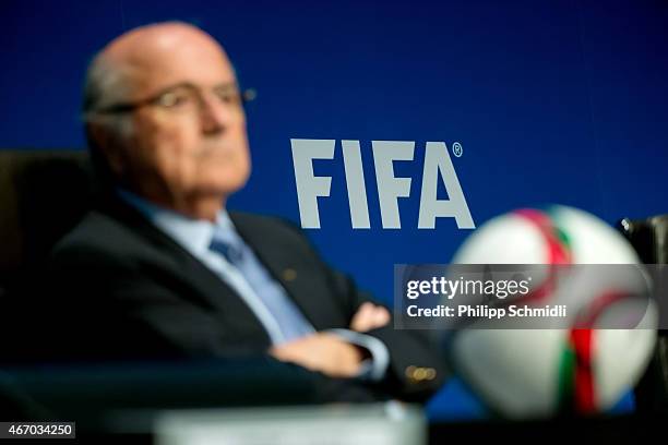 Logo sits on a wall behind FIFA President Joseph S. Blatter during a press conference at the end of the FIFA Executive Comitee meeting at the FIFA...