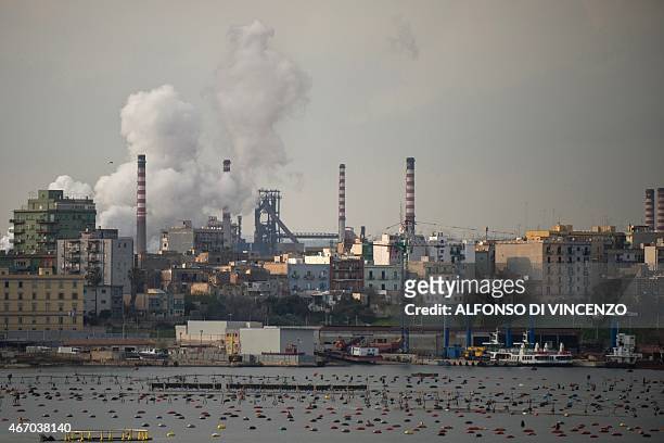 General view shows the Ilva steel plant in Taranto on March 18, 2015. The site in Taranto in the Puglia region of southern Italy, which employs over...