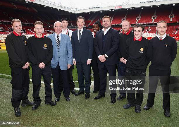 Chancellor of the Exchequer George Osborne meets Sir Bobby Charlton, Group Managing Director Richard Arnold of Manchester United and members of the...