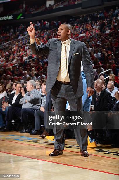 Melvin Hunt of the Denver Nuggets coaches against the Houston Rockets on March 19, 2015 at the Toyota Center in Houston, Texas. NOTE TO USER: User...