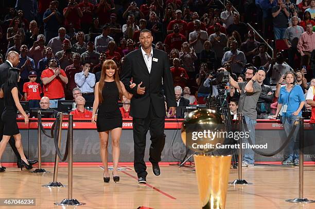 Eric Riley is honored for the 20th anniversary of the 1993-94 and 1994-95 NBA back-to-back championship teams during the game against the Denver...