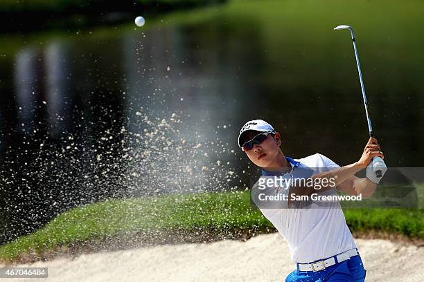 Sang-Moon Bae of South Korea hits a shot from a bunker on the 17th hole during the second round of the Arnold Palmer Invitational Presented By...