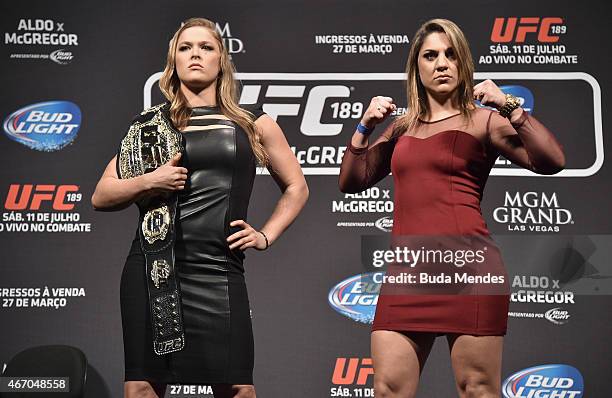 Women's Bantamweight Champion Ronda Rousey of the United States and Bethe Correia of Brazil pose for the media during the 189 World Media Tour Launch...