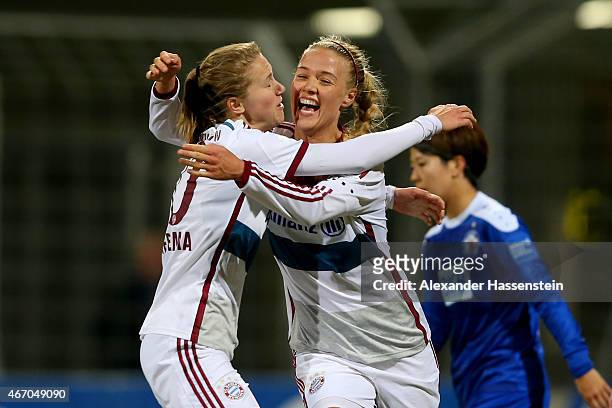 Dagny Brynjarsdottir of Muenchen celebrates scoring the opening goal with her team mate Vivianne Miedema during the Allianz Frauen-Bundesliga match...