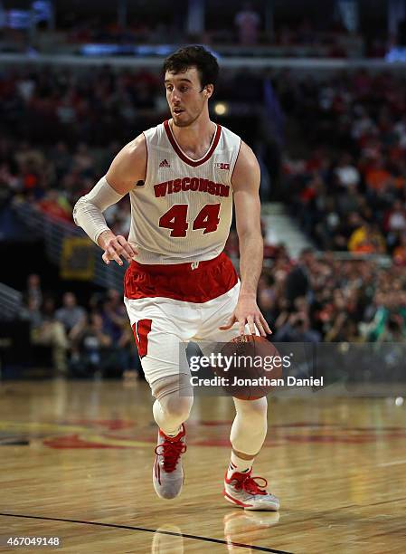 Frank Kaminsky of the Wisconsin Badgers moves against the Michigan State Spartans during the Championship game of the 2015 Big Ten Men's Basketball...