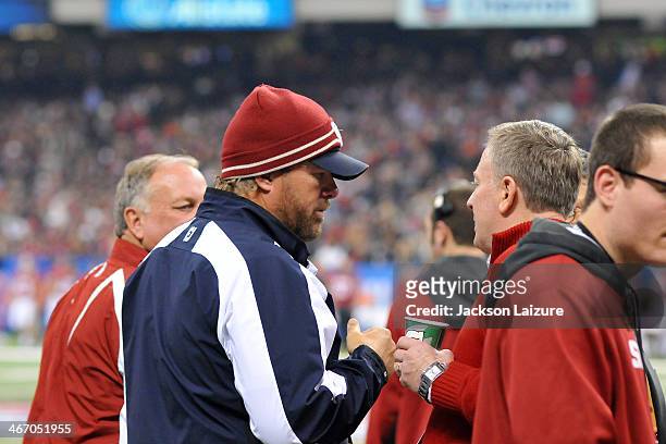 Country music singer and super fan Toby Keith wathces the Oklahoma Sooners from the sideline during their win against the Alabama Crimson Tide in the...