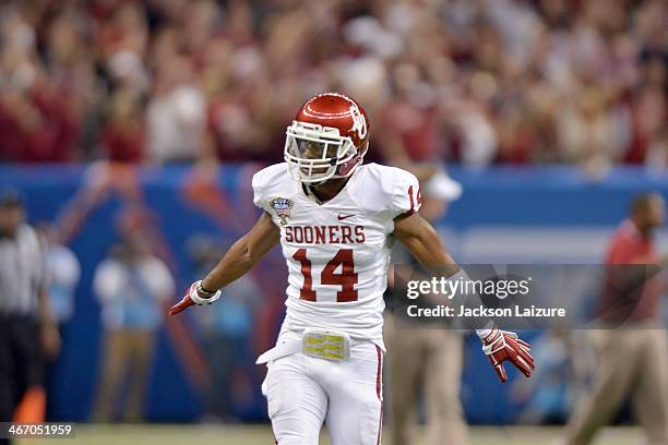 Cornerback Aaron Colvin of the Oklahoma Sooners celebrates a first half lead against the Alabama Crimson Tide during the Sooners' win in the BCS...