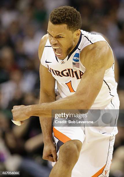 Justin Anderson of the Virginia Cavaliers reacts against the Belmont Bruins during the second round of the 2015 NCAA Men's Basketball Tournament at...