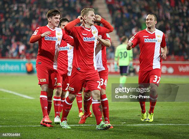Valmir Sulejmani,Sebastian Polter and Toni Leistner of 1 FC Union Berlin celebrate after scoring the 1:0 during the match between Union Berlin and FC...
