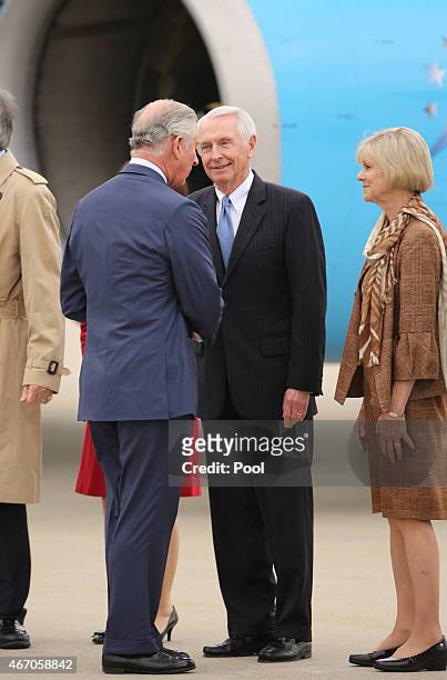 Prince Charles, Prince of Wales is greeted by by the Governor and First Lady of Kentucky, Steve and Jane Beshear, as he arrives at Louisville...