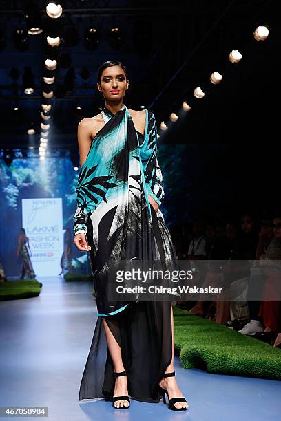 Model walks the runway during the SatyaPaul by Gauri Khan show on Day 3 of Lakme Fashion Week Summer/Resort 2015 at Palladium Hotel on March 20, 2015...