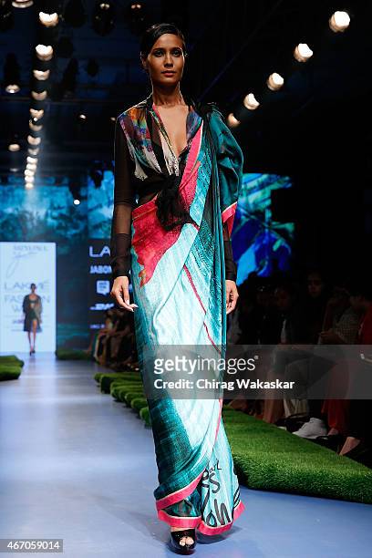 Model walks the runway during the SatyaPaul by Gauri Khan show on Day 3 of Lakme Fashion Week Summer/Resort 2015 at Palladium Hotel on March 20, 2015...