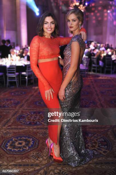 Alyssa Miller and Erin Heatherton attend the 2014 amfAR New York Gala at Cipriani Wall Street on February 5, 2014 in New York City.