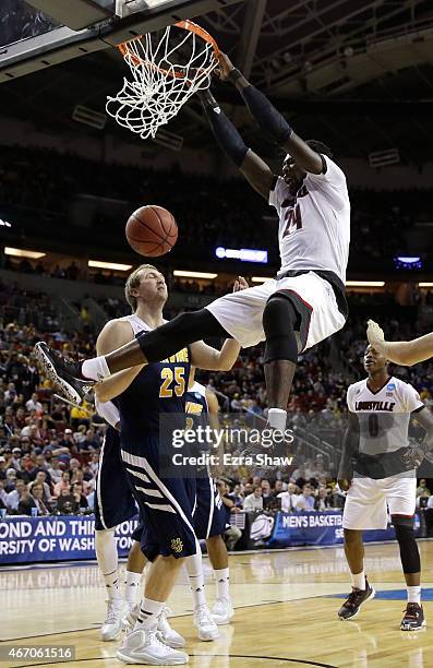 Montrezl Harrell of the Louisville Cardinals dunks against John Ryan of the UC Irvine Anteaters in the first half during the second round of the 2015...