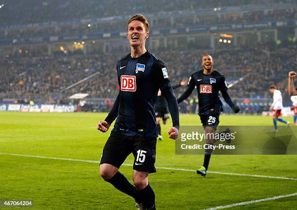 Sebastian Langkamp of Hertha BSC celebrates after scoring the 0:1 during the match between Hamburger SV and Hertha BSC on March 20, 2015 in Hamburg,...