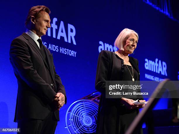 Liam Neeson and Vanessa Redgrave speak onstage during the 2014 amfAR New York Gala at Cipriani Wall Street on February 5, 2014 in New York City.