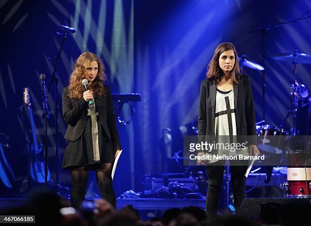 Maria Alyokhina and Nadezhda Tolokonnikova of Pussy Riot speak onstage at the Amnesty International Concert presented by the CBGB Festival at...