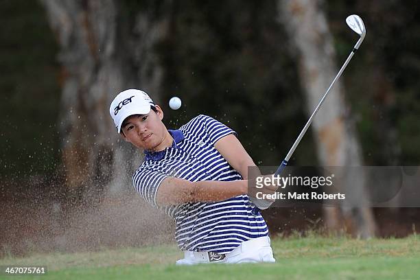 Yani Tseng of Taiwan chips from the bunker on the 15th hole during day one of the 2014 Ladies Masters at Royal Pines Resort on February 6, 2014 on...