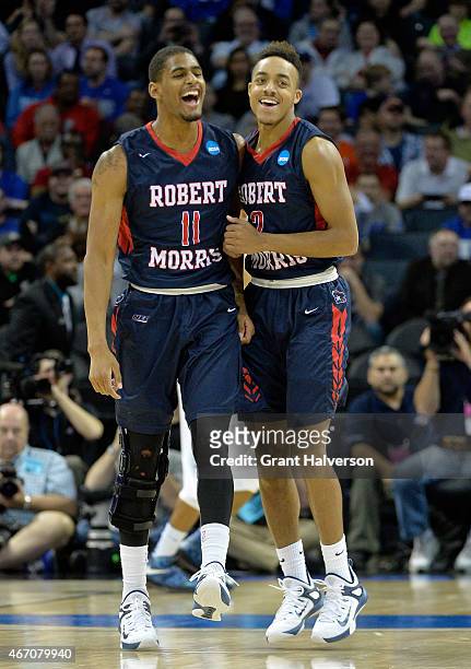 Teammates Rodney Pryor and Marcquise Reed of the Robert Morris Colonials react against the Duke Blue Devils during the second round of the 2015 NCAA...