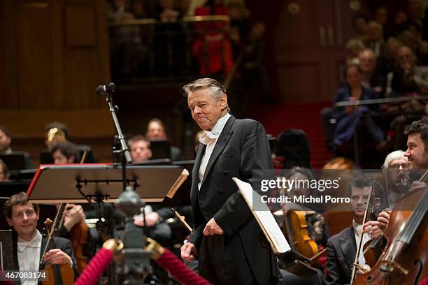 Latvian conductor Mariss Jansons acknowledges applause after his final concert with the Royal Concertgebouw Orchestra on March 20, 2015 in Amsterdam,...