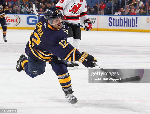 Brian Gionta of the Buffalo Sabres fires a slapshot against the New Jersey Devils on March 20, 2015 at the First Niagara Center in Buffalo, New York....