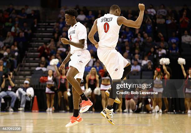 Teammates Skylar Spencer and Dwayne Polee II of the San Diego State Aztecs react against the St. John's Red Storm during the second round of the 2015...