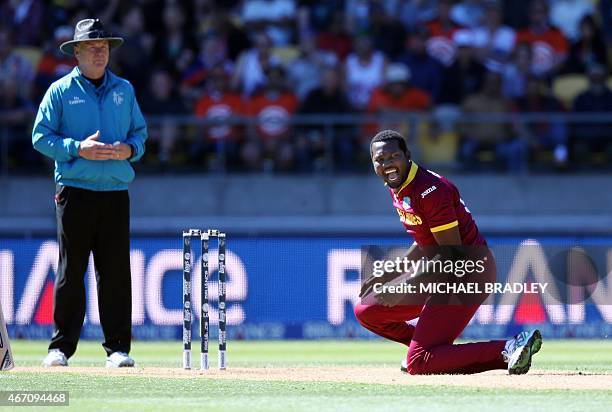 West Indies' Sulieman Benn makes an unsuccessful appeal during the 2015 Cricket World Cup quarter-final match between New Zealand and the West Indies...