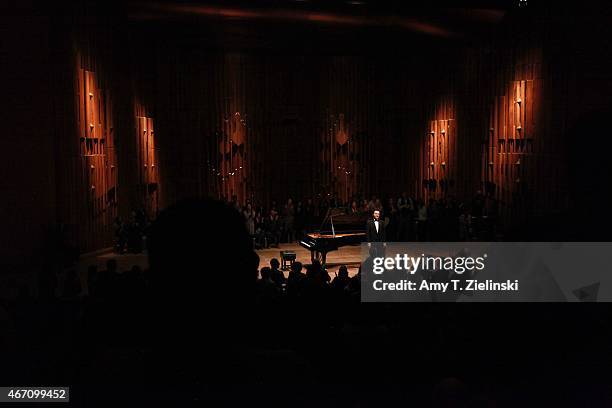 Russian concert pianist Evgeny Kissin receives applauds from the audience after performing a solo piano recital with works by composers Beethoven,...