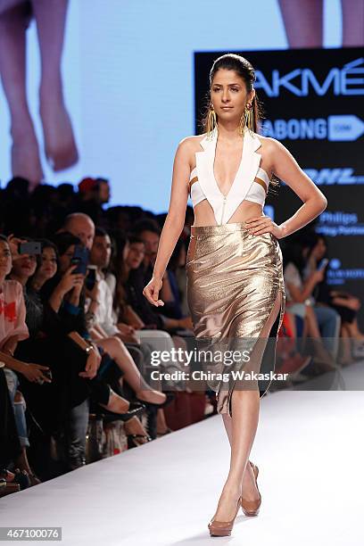 Model walks the runway during the Nikhil Thampi show on day 3 as part of Lakme Fashion Week Summer/Resort 2015 at Palladium Hotel on March 20, 2015...