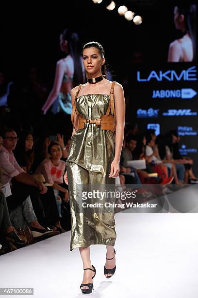 Model walks the runway during the Nikhil Thampi show on day 3 as part of Lakme Fashion Week Summer/Resort 2015 at Palladium Hotel on March 20, 2015...