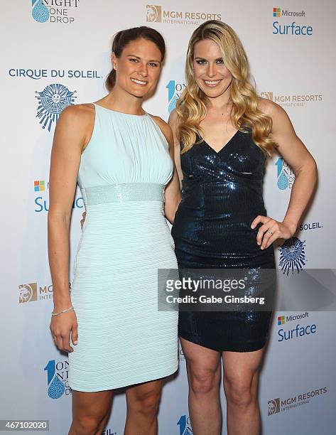 Olympic rowers Susan Francia Esther Lofgren arrive at the "One Night For ONE DROP" blue carpet event at 1 OAK Nightclub at The Mirage Hotel & Casino...