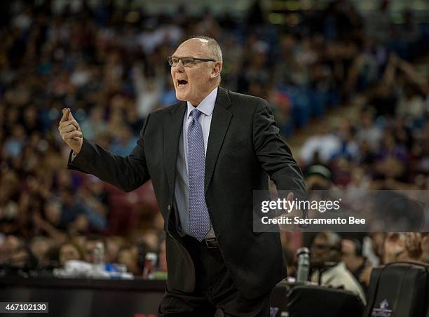 Sacramento Kings head coach George Karl screams at one of his players to pass the ball in the fourth quarter against the Charlotte Hornets at Sleep...