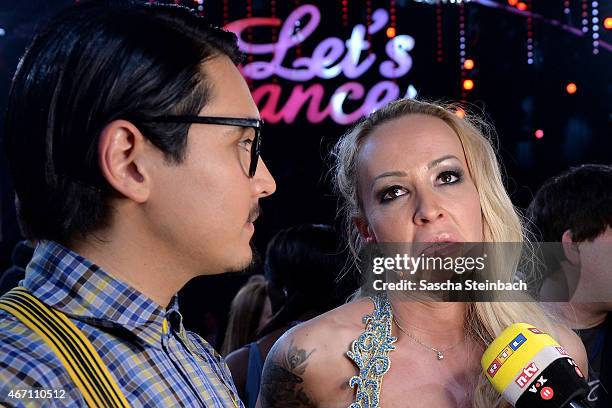 Defeated Erich Klann and Cora Schumacher react after the 2nd show of the television competition 'Let's Dance' on March 20, 2015 in Cologne, Germany.