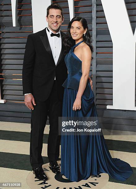 Professional football player Aaron Rodgers and actress Olivia Munn arrive at the 2015 Vanity Fair Oscar Party Hosted By Graydon Carter at Wallis...