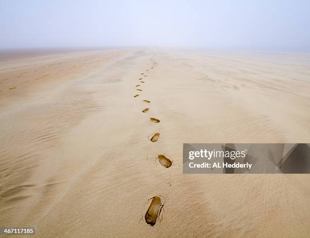 Footsteps in the sand at Harbour Cove