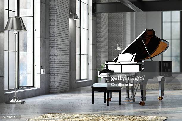 sleek black grand piano in well lit room - piano stock pictures, royalty-free photos & images