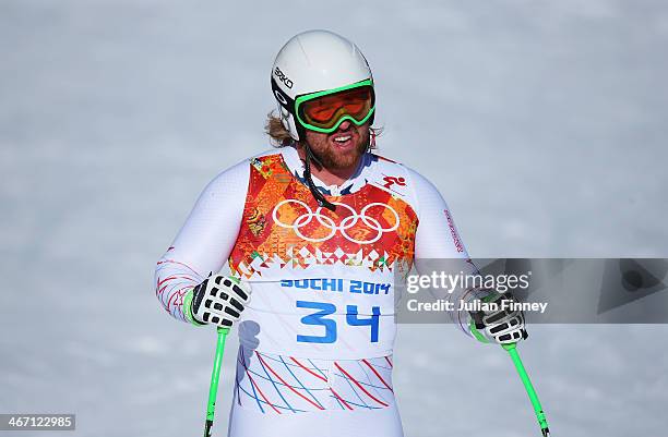 Erik Fisher of the United States finishes a run during training for the Alpine Skiing Men's Downhill ahead of the Sochi 2014 Winter Olympics at Rosa...