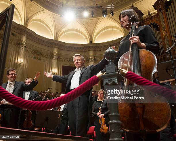 Latvian conductor Mariss Jansons acknowlegdes applause after his final concert with the Royal Concertgebouw Orchestra on March 20, 2015 in Amsterdam,...