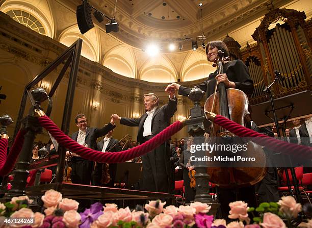 Latvian conductor Mariss Jansons acknowlegdes applause after his final concert with the Royal Concertgebouw Orchestra on March 20, 2015 in Amsterdam,...