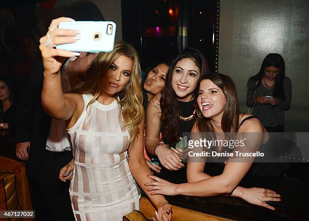 Khloe Kardashian takes a photo with fans at 1 OAK Nightclub at The Mirage Hotel and Casino on March 20, 2015 in Las Vegas, Nevada.