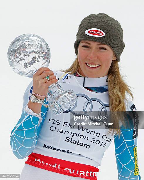 Mikaela Shiffrin of The USA poses with the crystal globe for the overall slalom winner after the FIS Alpine Ski World Cup women's slalom race on...