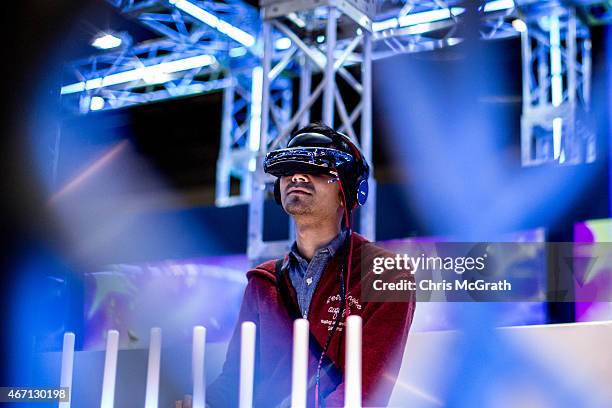 Man watches a concert on a virtual reality headset during the Anime Japan 2015 Expo on March 21, 2015 in Tokyo, Japan. AnimeJapan 2015, one of the...