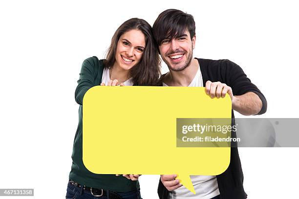 social media concept - two men holding banner stock pictures, royalty-free photos & images