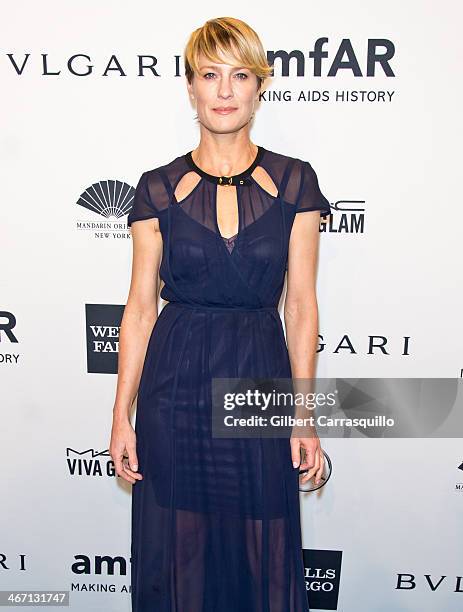 Actress Robin Wright attends the 2014 amfAR New York Gala at Cipriani Wall Street on February 5, 2014 in New York City.